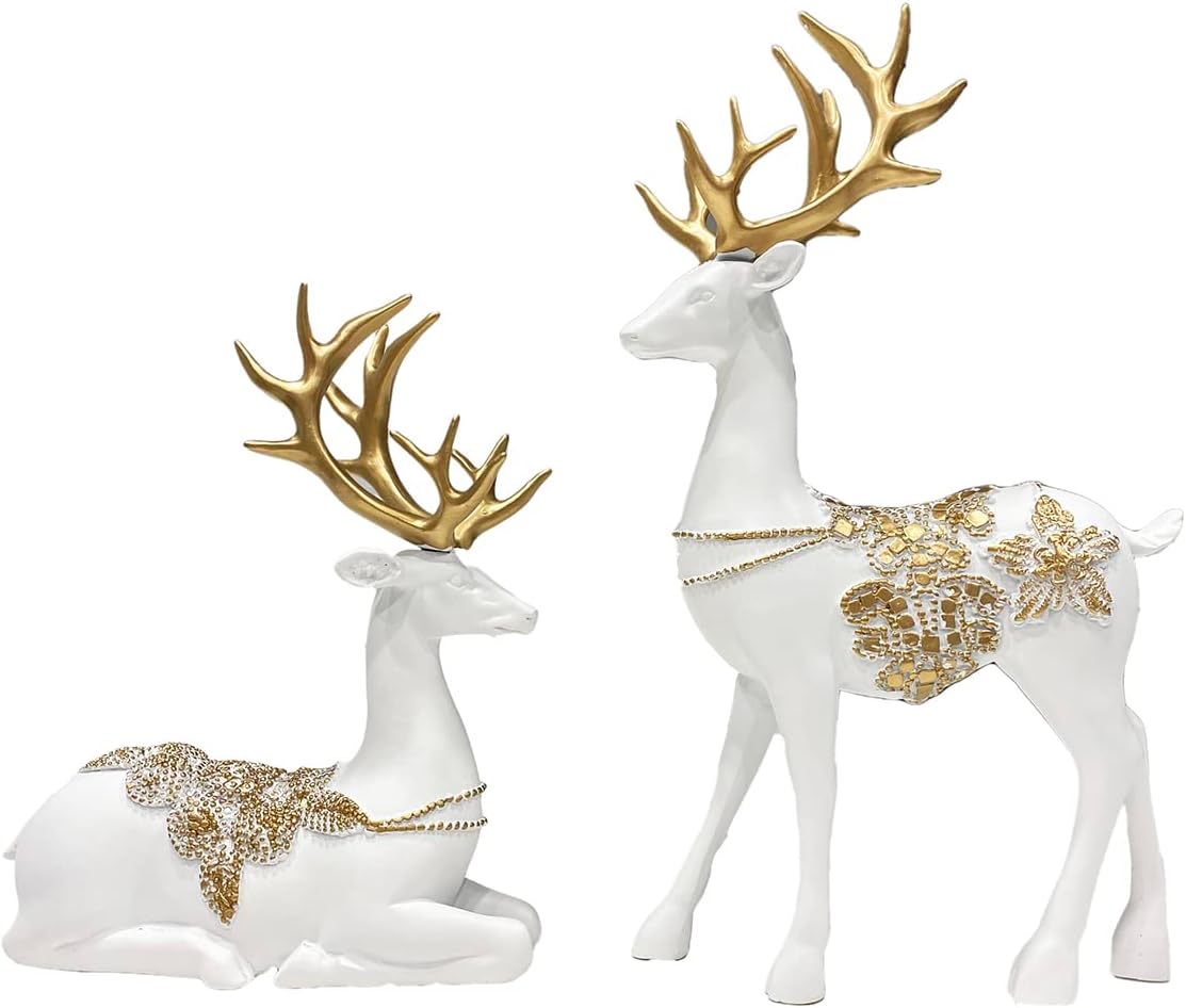Two Polyresin Reindeer Gold and White