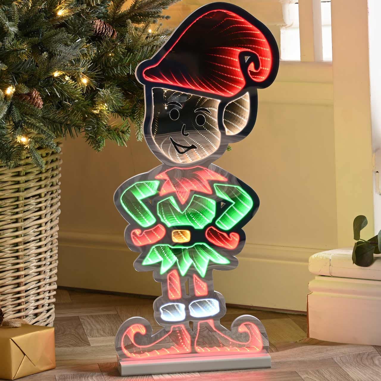 Infinity Lights - Standing Elf on wooden log with 387 LED Christmas lights - Christmasland Ireland for sale