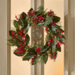 26 inch Magnolia Berry Pre-Lit Wreath with 50 warm white LED lights, battery operated for sale at Christmasland.ie in Dublin 14, Ireland. Shop sale now