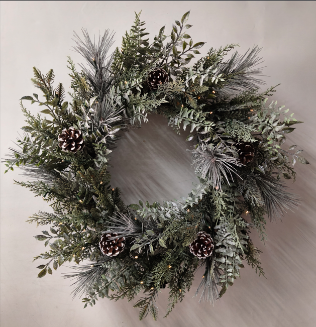 26 inch Wreath Winter Woodland with 50 Warm White LED with Pine Cones and 8 functions, battery operated for sale at Christmasland.ie in Dublin 14, Ireland. Shop sale now