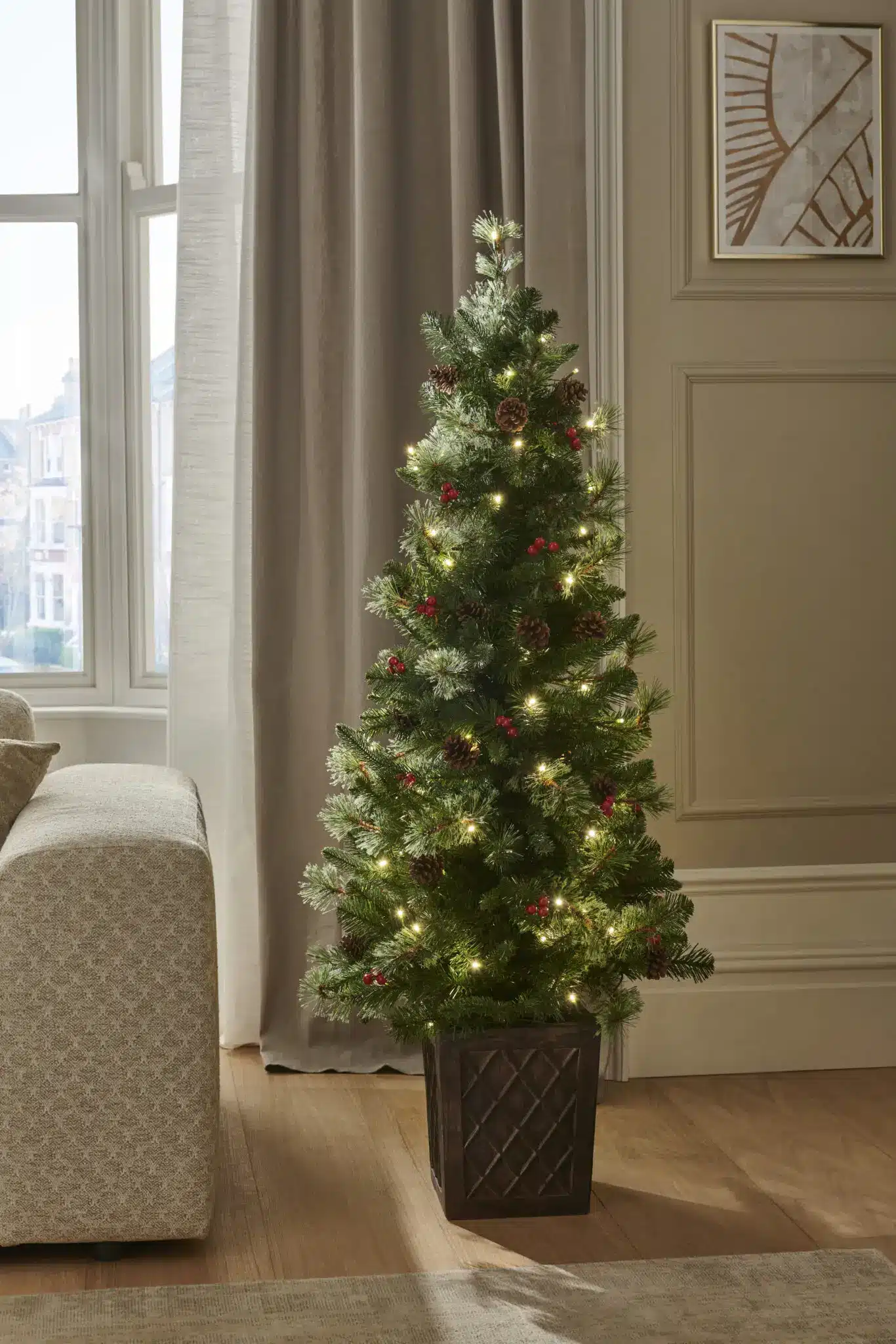 Best Pre-lit Small 4.5ft Brazil pine artificial Christmas Tree for sale from CHristmasland Ireland. Fast delivery