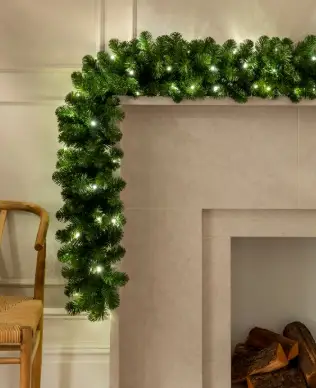 Buy 9ft Evergreen Pre-Lit Garland with 100 Warm White LED Lights - Christmas Garlands for Sale from Christmasland