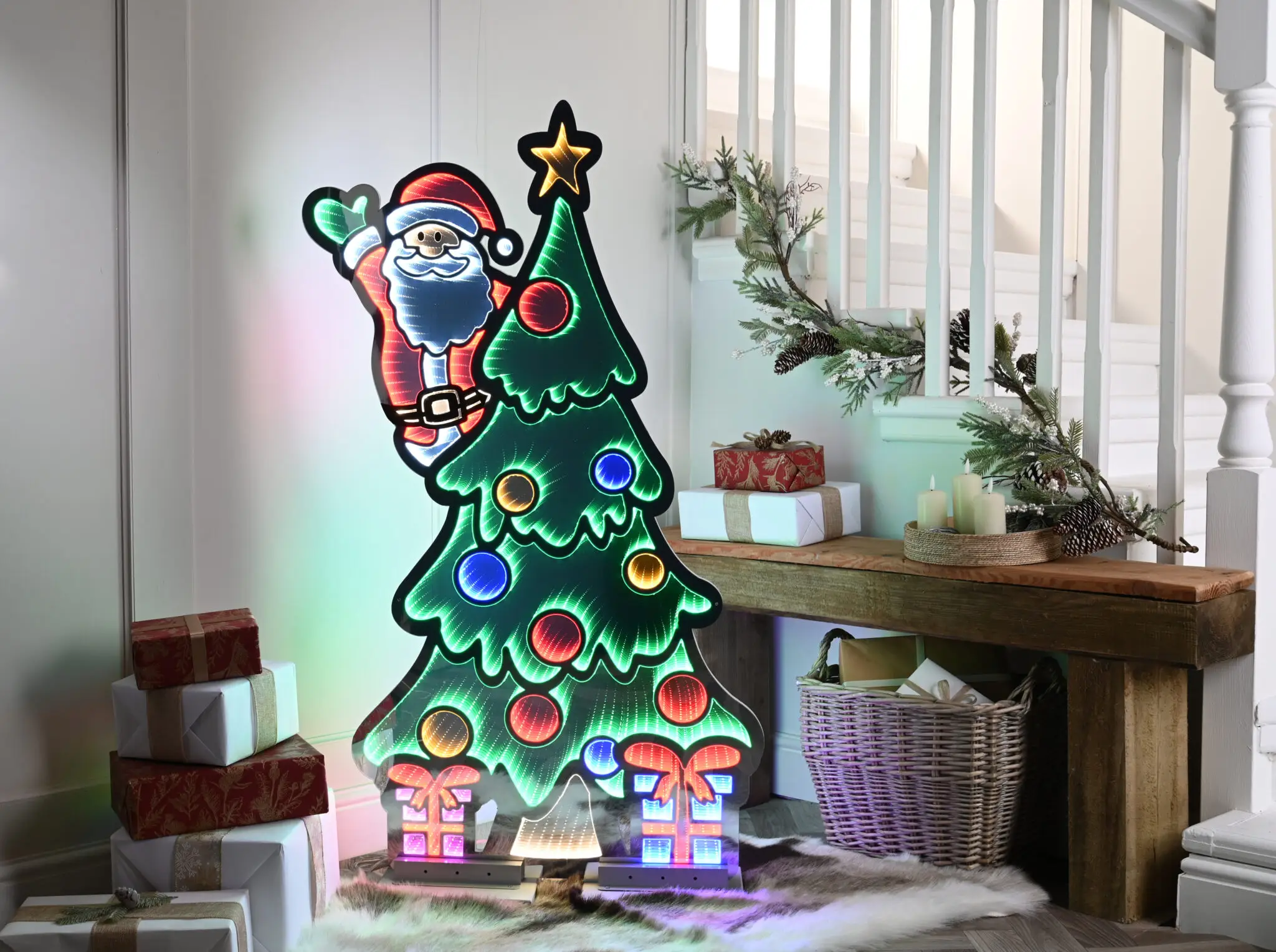 Buy Christmas Tree made of Infinity LED Lights. Santa on Christmas Tree is a unique offering from Christmasland - Dublin's Favourite Christmas Shop