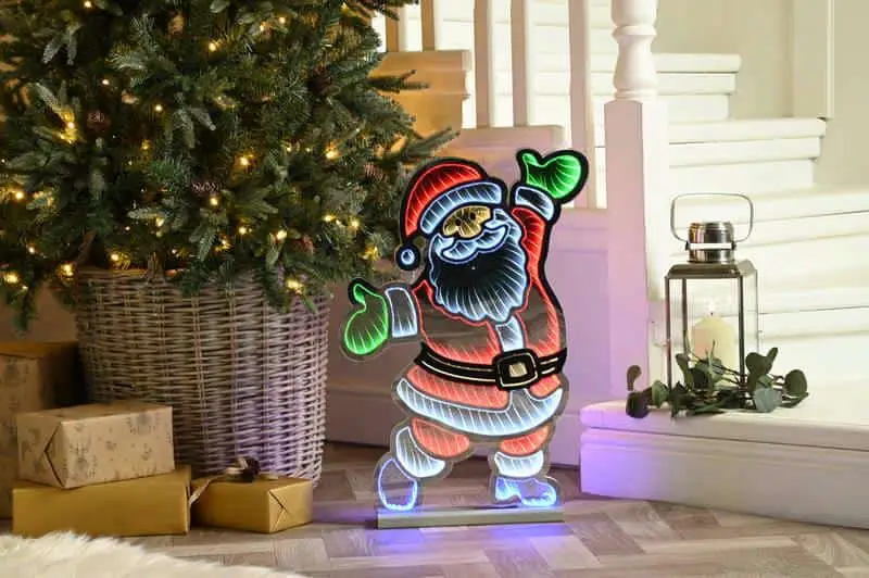 Infinity Lights - Standing santa on wooden log with 387 LED Christmas lights - Christmasland Ireland