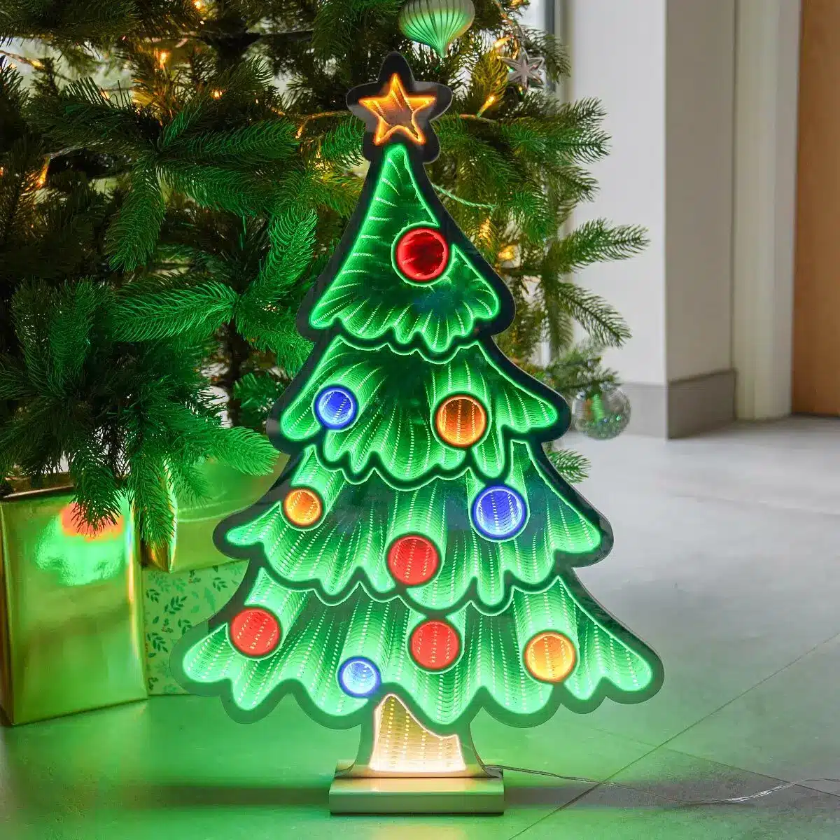 Infinity Lights - Christmas tree figure on wooden log with 387 LED Christmas lights - Christmasland Ireland