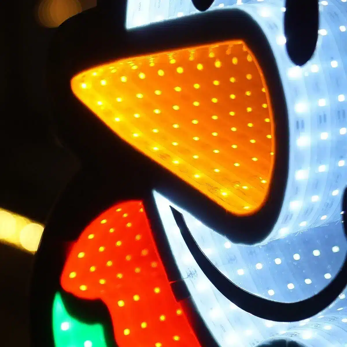 Infinity Lights - Snowman figure on wooden log with 387 LED Christmas lights - Christmasland Ireland