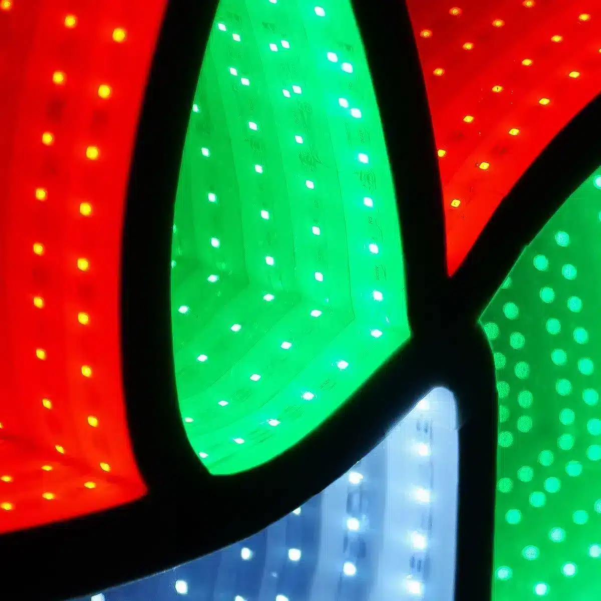 Infinity Lights - Snowman figure on wooden log with 387 LED Christmas lights - Christmasland Ireland